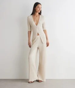 Pantalone a coste lamé