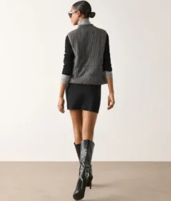 Piumino smanicato reversibile a coste intrecciate in cashmere