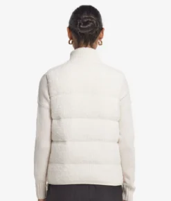 Piumino smanicato reversibile in bouclé