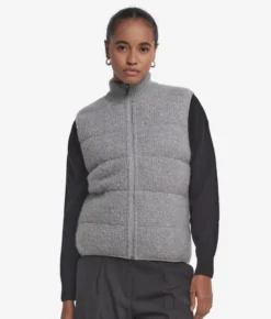 Piumino smanicato reversibile in bouclé