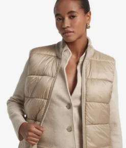 Piumino smanicato reversibile in bouclé